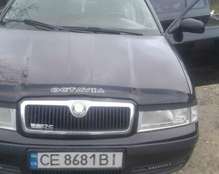 Черный Шкода Октавия, объемом двигателя 1.6 л и пробегом 278 тыс. км за 3800 $, фото 1 на Automoto.ua