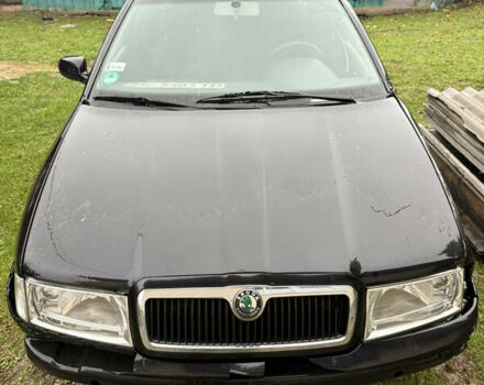 Черный Шкода Октавия, объемом двигателя 2 л и пробегом 320 тыс. км за 3500 $, фото 1 на Automoto.ua