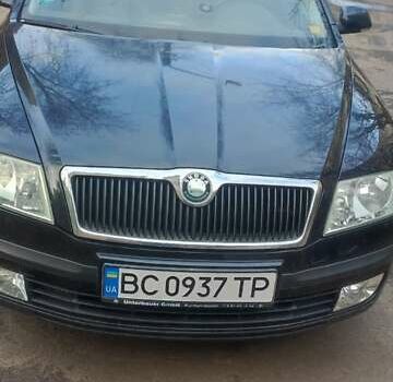 Черный Шкода Октавия, объемом двигателя 1.6 л и пробегом 235 тыс. км за 5400 $, фото 1 на Automoto.ua