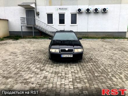 Черный Шкода Октавия, объемом двигателя 1.8 л и пробегом 300 тыс. км за 3700 $, фото 1 на Automoto.ua