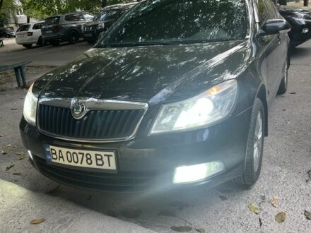 Чорний Шкода Октавія, об'ємом двигуна 2 л та пробігом 240 тис. км за 5716 $, фото 1 на Automoto.ua