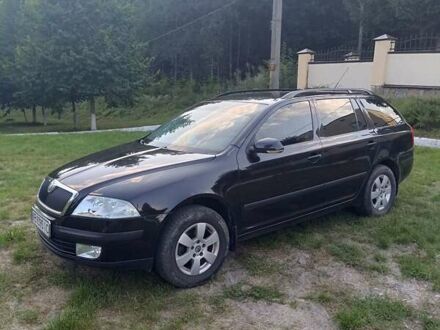 Черный Шкода Октавия, объемом двигателя 1.6 л и пробегом 252 тыс. км за 5800 $, фото 1 на Automoto.ua