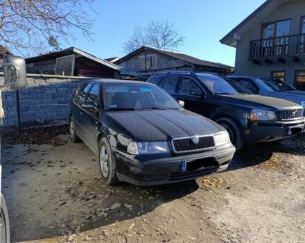 Чорний Шкода Октавія, об'ємом двигуна 2 л та пробігом 320 тис. км за 2000 $, фото 1 на Automoto.ua