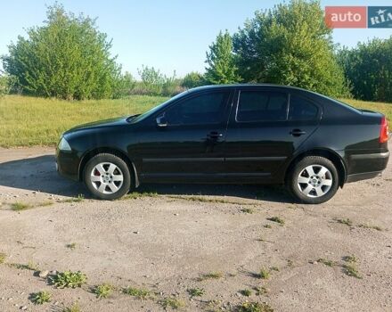 Черный Шкода Октавия, объемом двигателя 1.6 л и пробегом 223 тыс. км за 5700 $, фото 1 на Automoto.ua