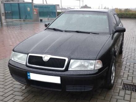 Черный Шкода Октавия, объемом двигателя 1.6 л и пробегом 180 тыс. км за 5250 $, фото 1 на Automoto.ua
