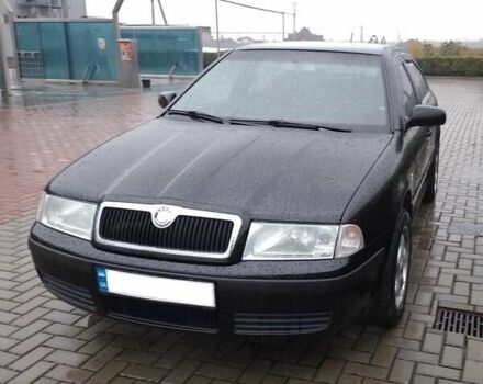 Черный Шкода Октавия, объемом двигателя 1.6 л и пробегом 180 тыс. км за 5250 $, фото 1 на Automoto.ua