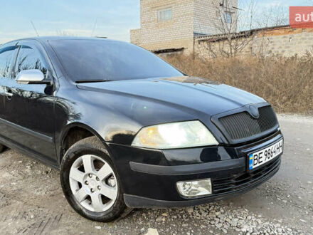 Черный Шкода Октавия, объемом двигателя 1.6 л и пробегом 287 тыс. км за 5600 $, фото 1 на Automoto.ua