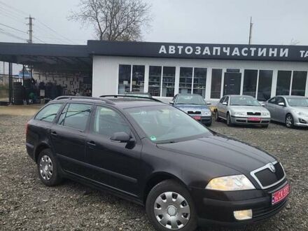 Черный Шкода Октавия, объемом двигателя 1.6 л и пробегом 165 тыс. км за 6750 $, фото 1 на Automoto.ua