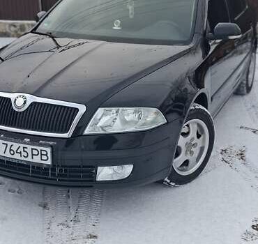 Черный Шкода Октавия, объемом двигателя 1.6 л и пробегом 305 тыс. км за 5999 $, фото 1 на Automoto.ua