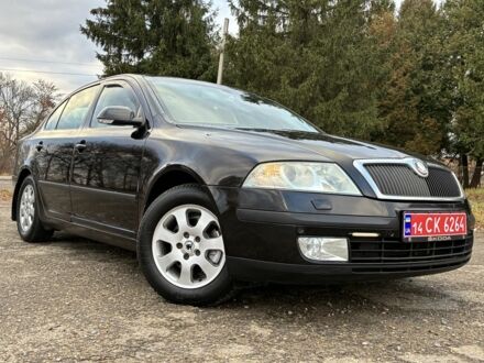 Черный Шкода Октавия, объемом двигателя 1.6 л и пробегом 180 тыс. км за 5750 $, фото 1 на Automoto.ua