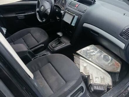 Черный Шкода Октавия, объемом двигателя 1.6 л и пробегом 210 тыс. км за 2000 $, фото 1 на Automoto.ua