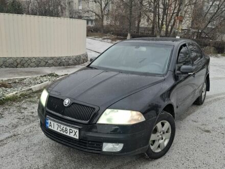 Черный Шкода Октавия, объемом двигателя 1.6 л и пробегом 279 тыс. км за 5700 $, фото 1 на Automoto.ua