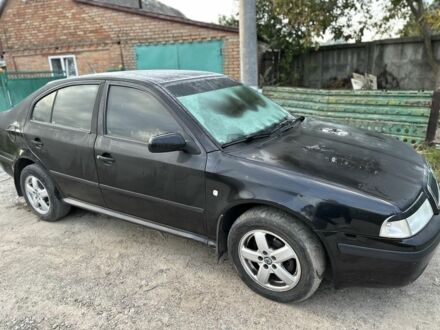 Черный Шкода Октавия, объемом двигателя 1.6 л и пробегом 210 тыс. км за 5200 $, фото 1 на Automoto.ua