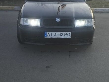 Черный Шкода Октавия, объемом двигателя 1.8 л и пробегом 270 тыс. км за 5400 $, фото 1 на Automoto.ua