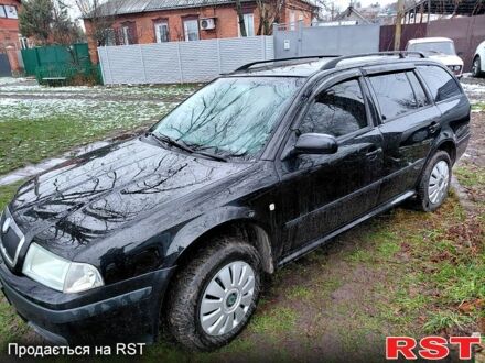 Черный Шкода Октавия, объемом двигателя 1.6 л и пробегом 187 тыс. км за 5700 $, фото 1 на Automoto.ua