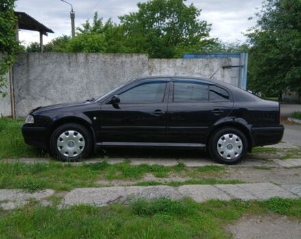 Черный Шкода Октавия, объемом двигателя 1.6 л и пробегом 230 тыс. км за 5500 $, фото 1 на Automoto.ua