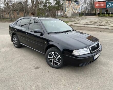 Черный Шкода Октавия, объемом двигателя 1.6 л и пробегом 292 тыс. км за 5250 $, фото 1 на Automoto.ua