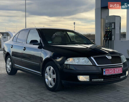 Черный Шкода Октавия, объемом двигателя 1.6 л и пробегом 214 тыс. км за 6500 $, фото 1 на Automoto.ua