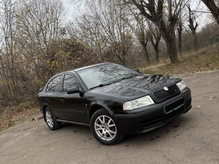 Черный Шкода Октавия, объемом двигателя 1.8 л и пробегом 297 тыс. км за 6500 $, фото 1 на Automoto.ua