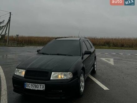 Черный Шкода Октавия, объемом двигателя 1.6 л и пробегом 265 тыс. км за 5800 $, фото 1 на Automoto.ua