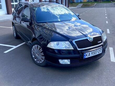 Черный Шкода Октавия, объемом двигателя 1.6 л и пробегом 220 тыс. км за 5600 $, фото 1 на Automoto.ua