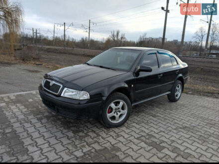 Черный Шкода Октавия, объемом двигателя 1.6 л и пробегом 370 тыс. км за 5300 $, фото 1 на Automoto.ua