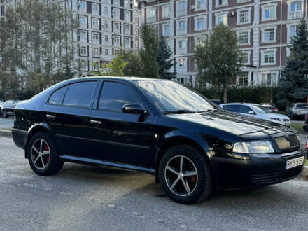 Черный Шкода Октавия, объемом двигателя 1.6 л и пробегом 257 тыс. км за 5800 $, фото 1 на Automoto.ua