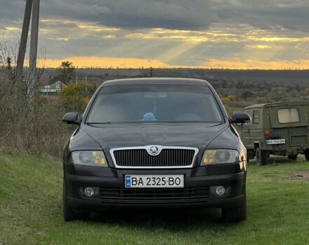 Черный Шкода Октавия, объемом двигателя 1.6 л и пробегом 336 тыс. км за 5700 $, фото 1 на Automoto.ua