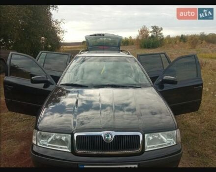 Черный Шкода Октавия, объемом двигателя 1.6 л и пробегом 155 тыс. км за 5800 $, фото 1 на Automoto.ua