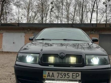 Черный Шкода Октавия, объемом двигателя 1.8 л и пробегом 265 тыс. км за 7000 $, фото 1 на Automoto.ua