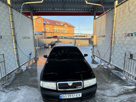 Черный Шкода Октавия, объемом двигателя 1.6 л и пробегом 210 тыс. км за 5500 $, фото 1 на Automoto.ua