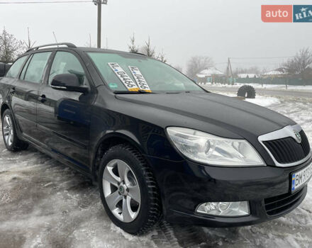 Черный Шкода Октавия, объемом двигателя 1.6 л и пробегом 192 тыс. км за 8299 $, фото 1 на Automoto.ua