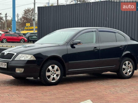 Черный Шкода Октавия, объемом двигателя 2 л и пробегом 230 тыс. км за 6950 $, фото 1 на Automoto.ua