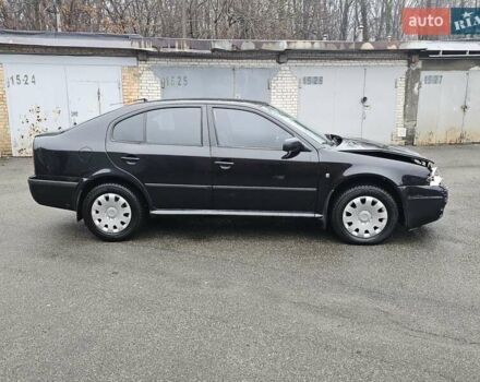 Черный Шкода Октавия, объемом двигателя 1.6 л и пробегом 210 тыс. км за 2000 $, фото 1 на Automoto.ua