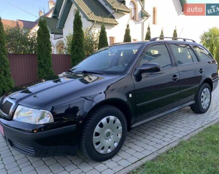 Черный Шкода Октавия, объемом двигателя 1.6 л и пробегом 200 тыс. км за 5999 $, фото 1 на Automoto.ua
