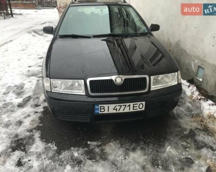 Черный Шкода Октавия, объемом двигателя 1.6 л и пробегом 245 тыс. км за 5900 $, фото 1 на Automoto.ua