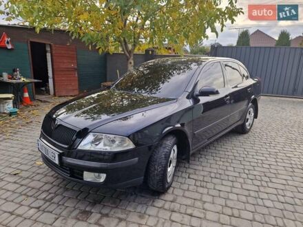 Черный Шкода Октавия, объемом двигателя 1.6 л и пробегом 213 тыс. км за 5800 $, фото 1 на Automoto.ua