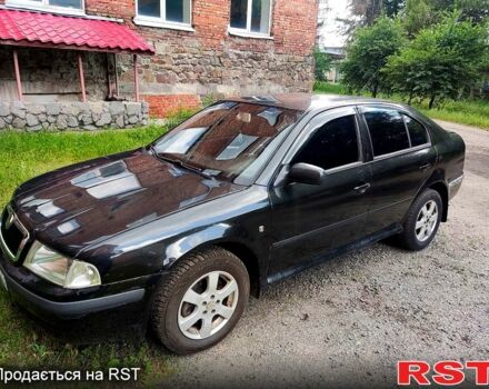 Черный Шкода Октавия, объемом двигателя 1.8 л и пробегом 185 тыс. км за 4500 $, фото 1 на Automoto.ua