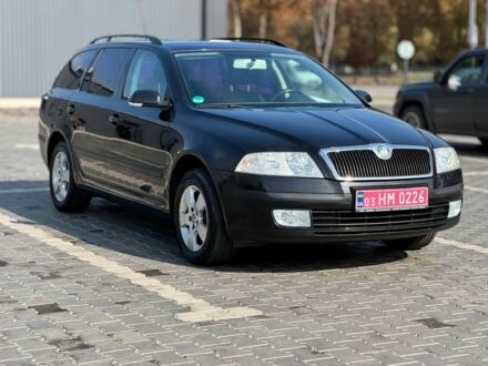 Чорний Шкода Октавія, об'ємом двигуна 1.6 л та пробігом 215 тис. км за 6999 $, фото 1 на Automoto.ua