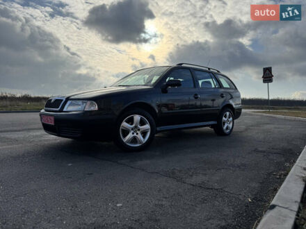 Черный Шкода Октавия, объемом двигателя 1.6 л и пробегом 197 тыс. км за 5555 $, фото 1 на Automoto.ua