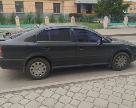Черный Шкода Октавия, объемом двигателя 1.6 л и пробегом 238 тыс. км за 3700 $, фото 1 на Automoto.ua