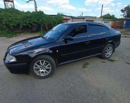 Черный Шкода Октавия, объемом двигателя 1.8 л и пробегом 146 тыс. км за 5950 $, фото 1 на Automoto.ua