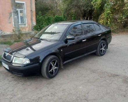 Черный Шкода Октавия, объемом двигателя 1.9 л и пробегом 395 тыс. км за 4800 $, фото 1 на Automoto.ua