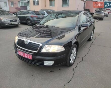 Черный Шкода Октавия, объемом двигателя 1.6 л и пробегом 198 тыс. км за 6999 $, фото 1 на Automoto.ua