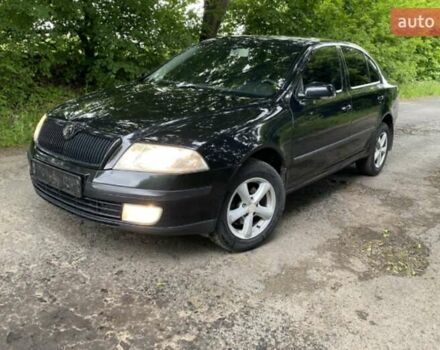 Черный Шкода Октавия, объемом двигателя 1.6 л и пробегом 218 тыс. км за 6550 $, фото 1 на Automoto.ua