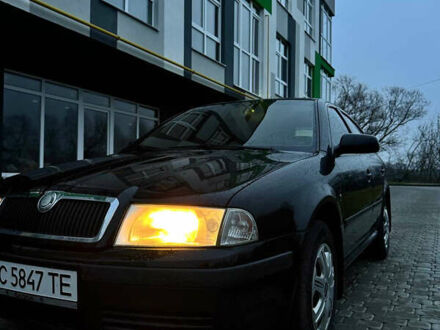 Черный Шкода Октавия, объемом двигателя 1.6 л и пробегом 245 тыс. км за 5400 $, фото 1 на Automoto.ua