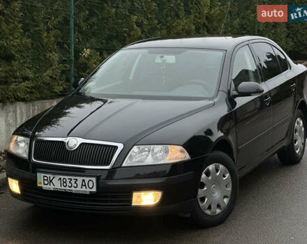 Черный Шкода Октавия, объемом двигателя 1.6 л и пробегом 223 тыс. км за 6300 $, фото 1 на Automoto.ua