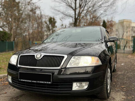 Черный Шкода Октавия, объемом двигателя 1.6 л и пробегом 211 тыс. км за 6800 $, фото 1 на Automoto.ua