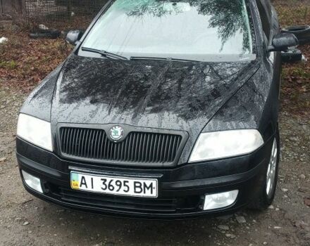 Черный Шкода Октавия, объемом двигателя 2 л и пробегом 240 тыс. км за 5000 $, фото 1 на Automoto.ua