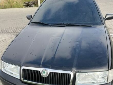 Черный Шкода Октавия, объемом двигателя 1.8 л и пробегом 73 тыс. км за 10000 $, фото 1 на Automoto.ua